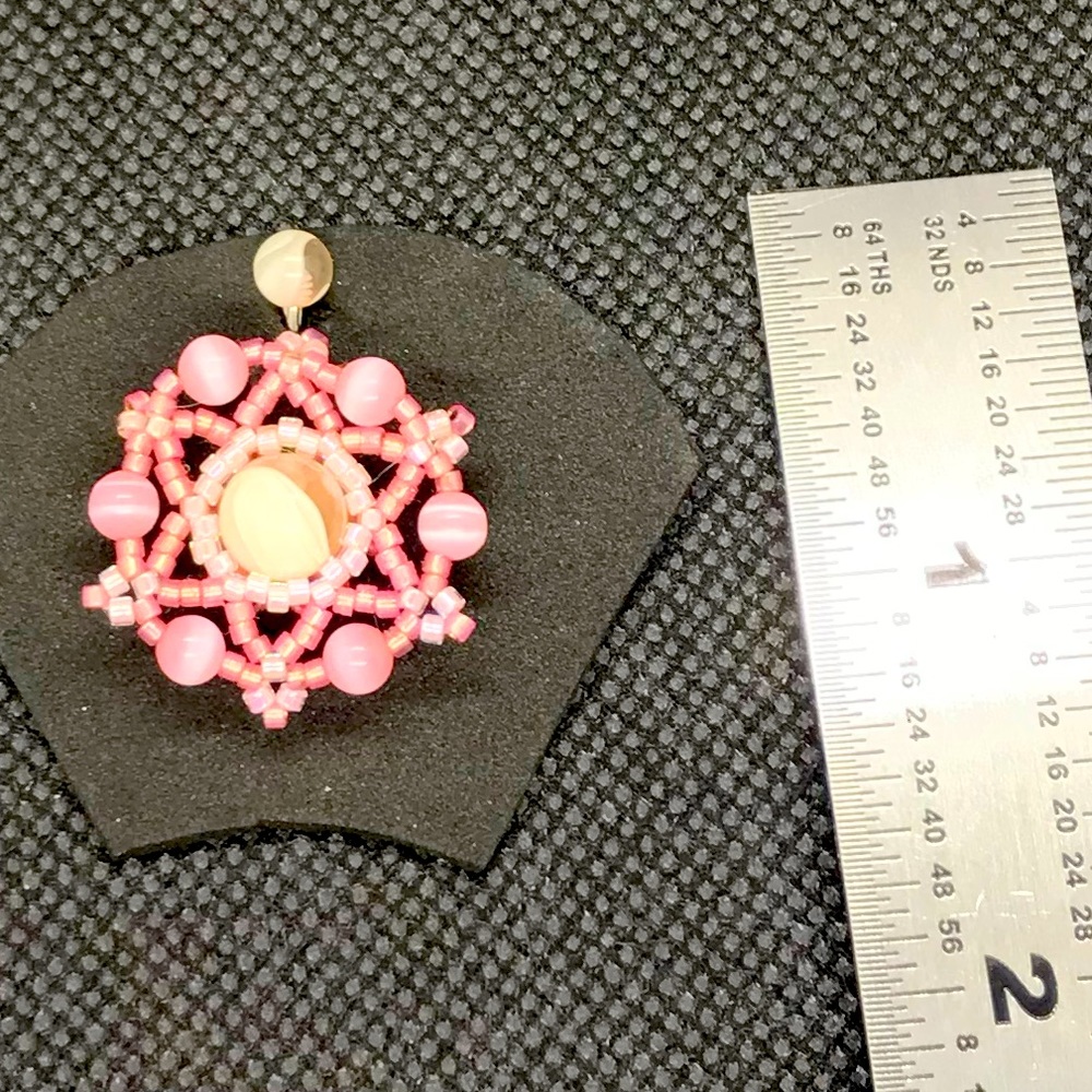 Flexible beaded belly ring/shield